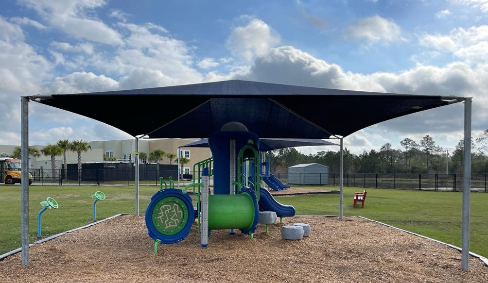 ShadePort freestanding canopy over a playground